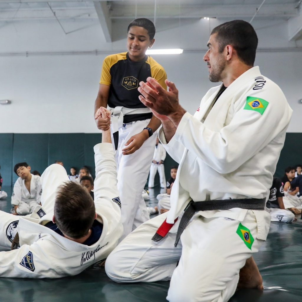 Adults drilling beginner self-defense Jiu-Jitsu techniques at Gracie Jiu-Jitsu San Jose in San Jose.