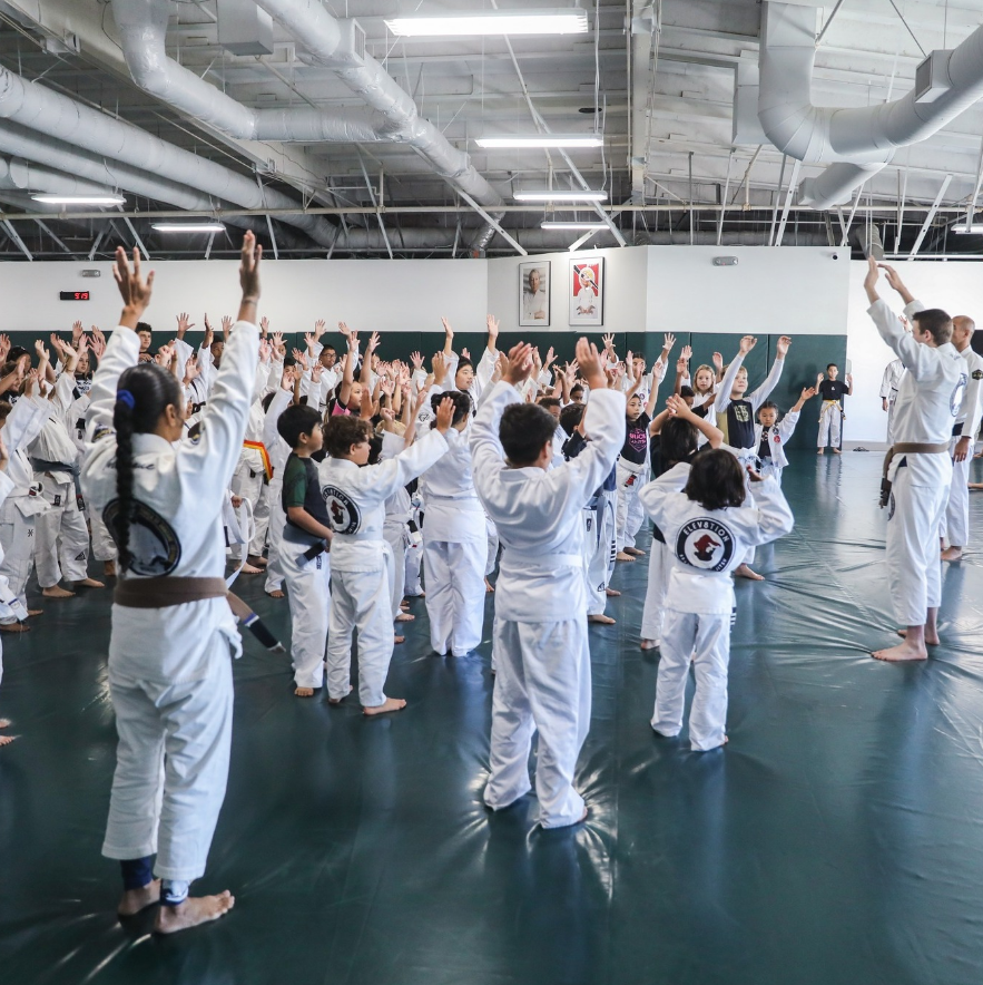 Beginner students drilling a mount escape at Gracie Jiu-Jitsu San Jose in San Jose, CA for safer, faster progress.