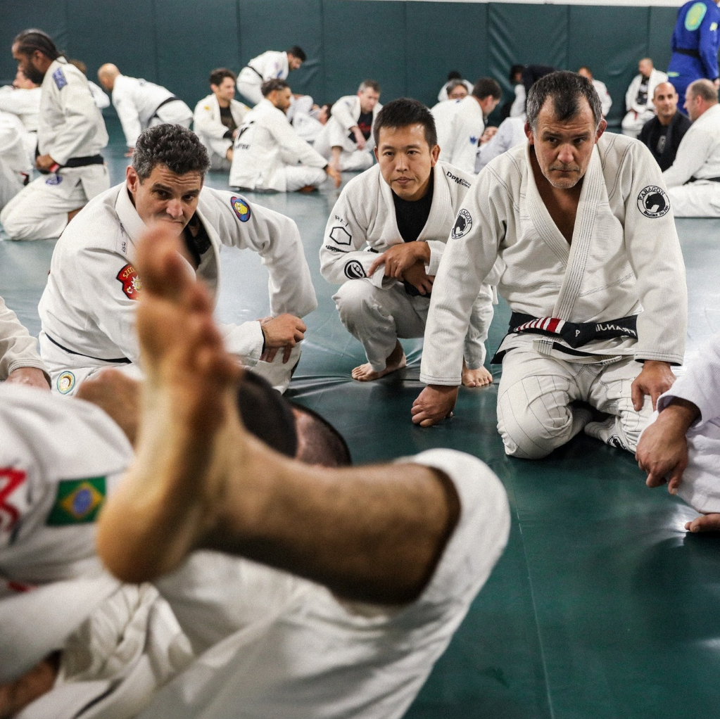 Families training together on the mats at Gracie Jiu-Jitsu San Jose in San Jose, CA for fitness and unity