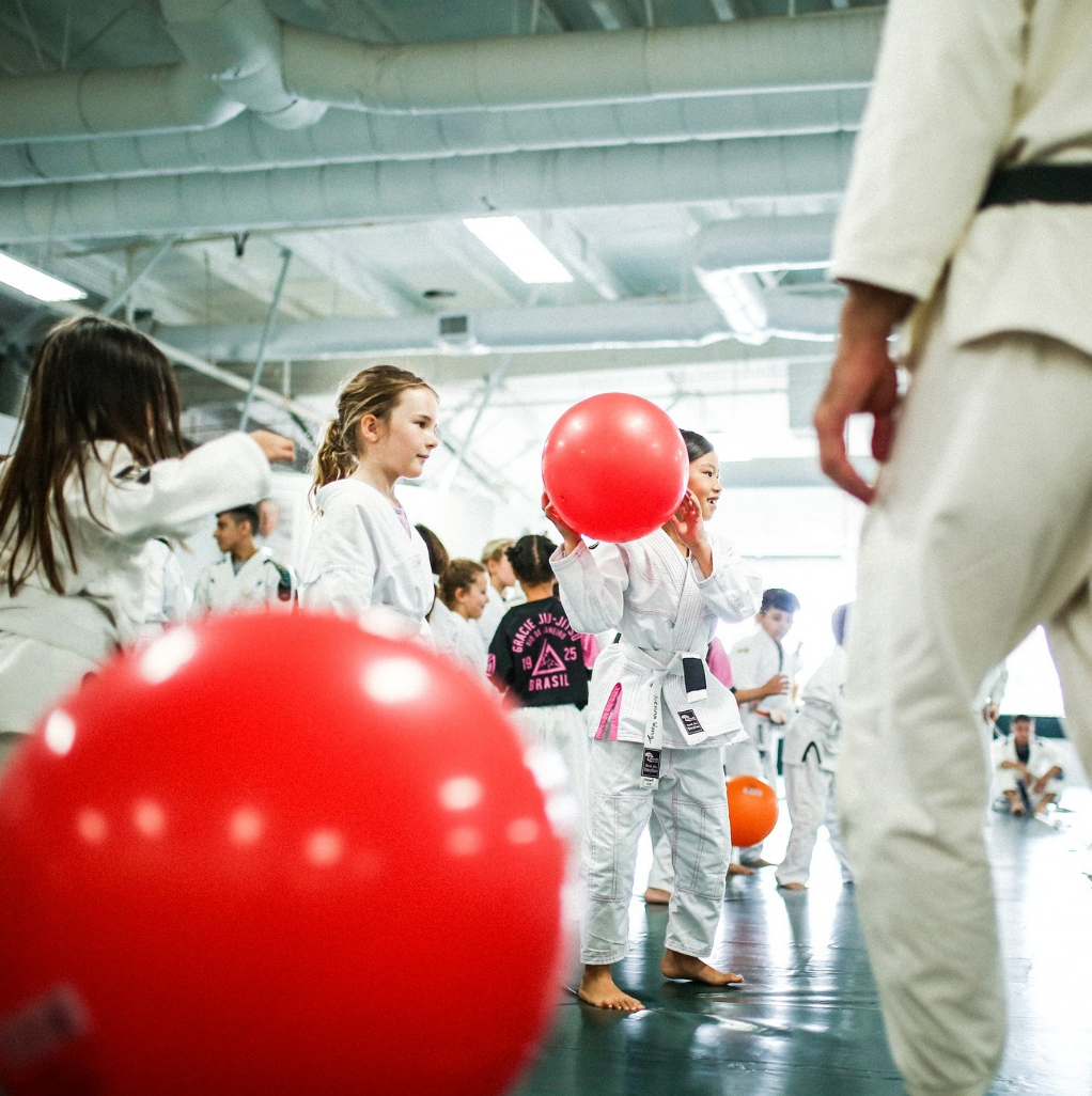 Adults practicing Jiu-Jitsu drills at Gracie Jiu-Jitsu San Jose in San Jose, CA, building fitness.