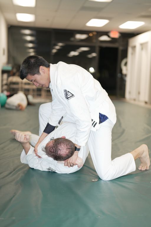 Adults drilling Jiu-Jitsu techniques at Gracie Jiu-Jitsu San Jose in San Jose, CA, building strength and community