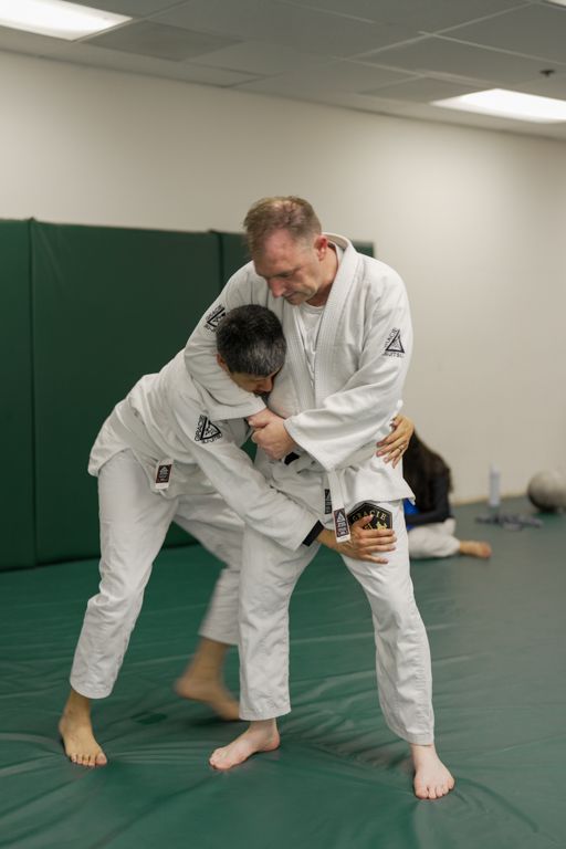 Adult students practicing controlled grappling at Gracie Jiu-Jitsu San Jose in San Jose, CA.