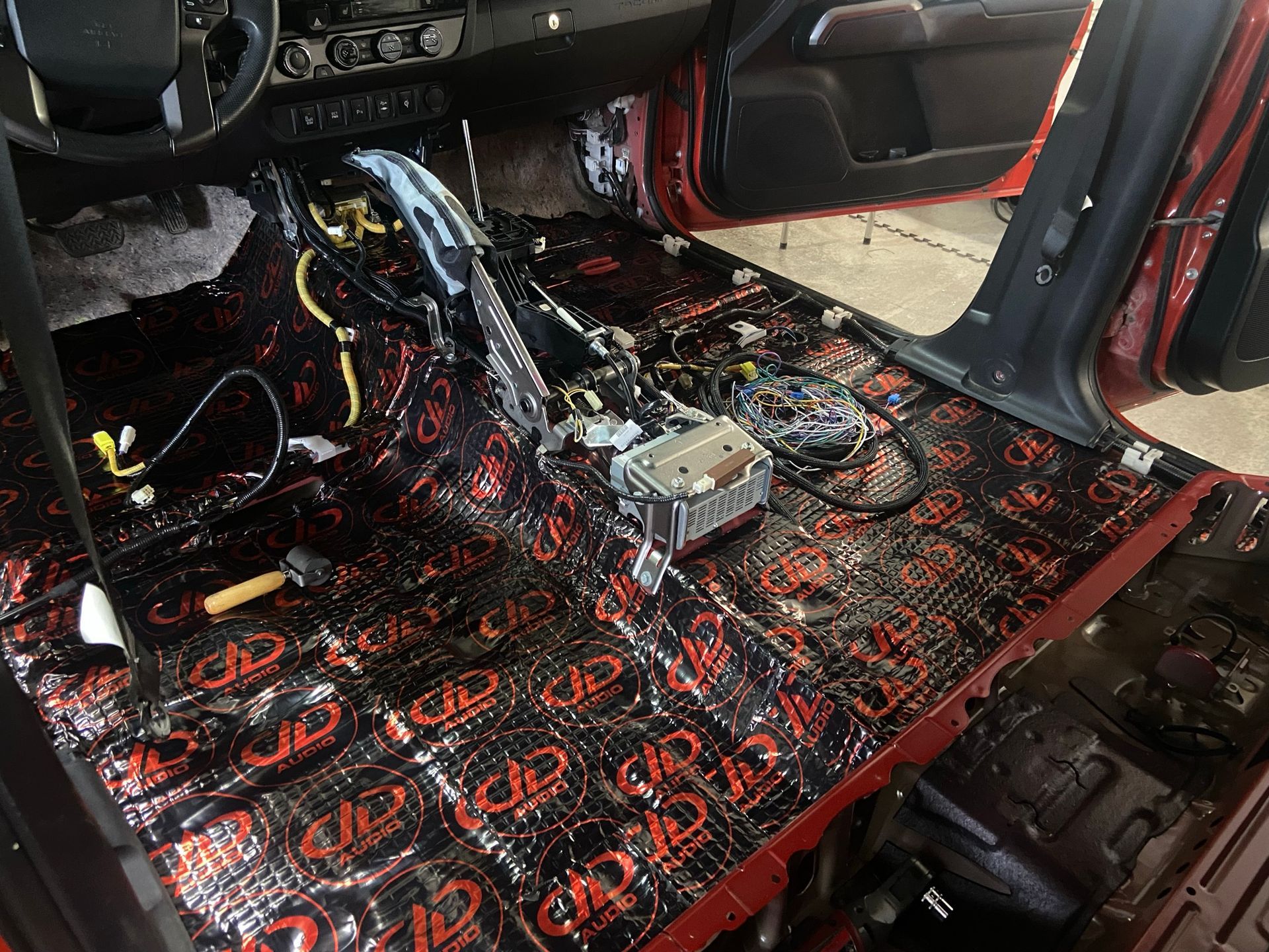 The inside of a car with a lot of foam on the floor.