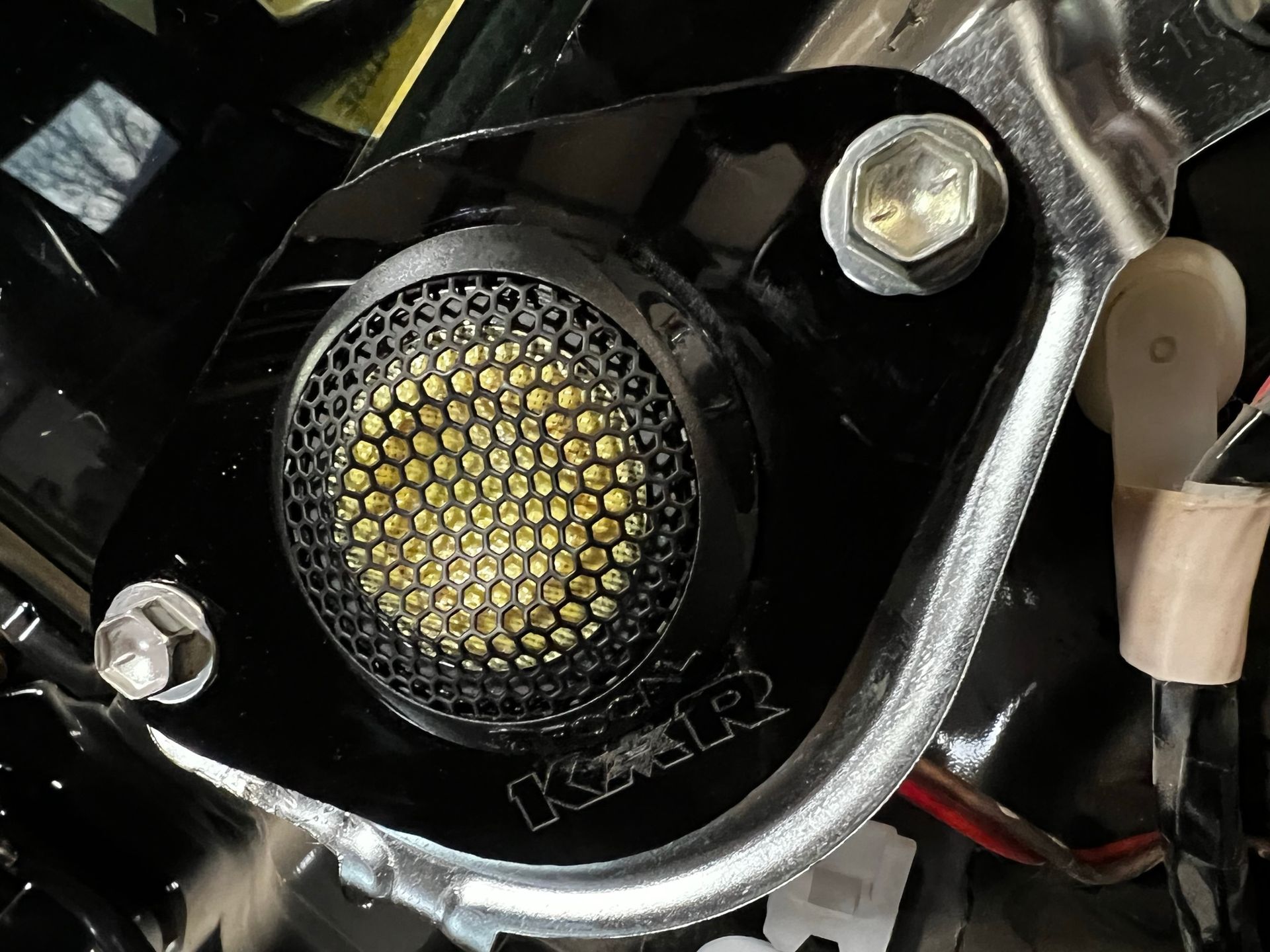 A close up of a speaker that says kzr on it