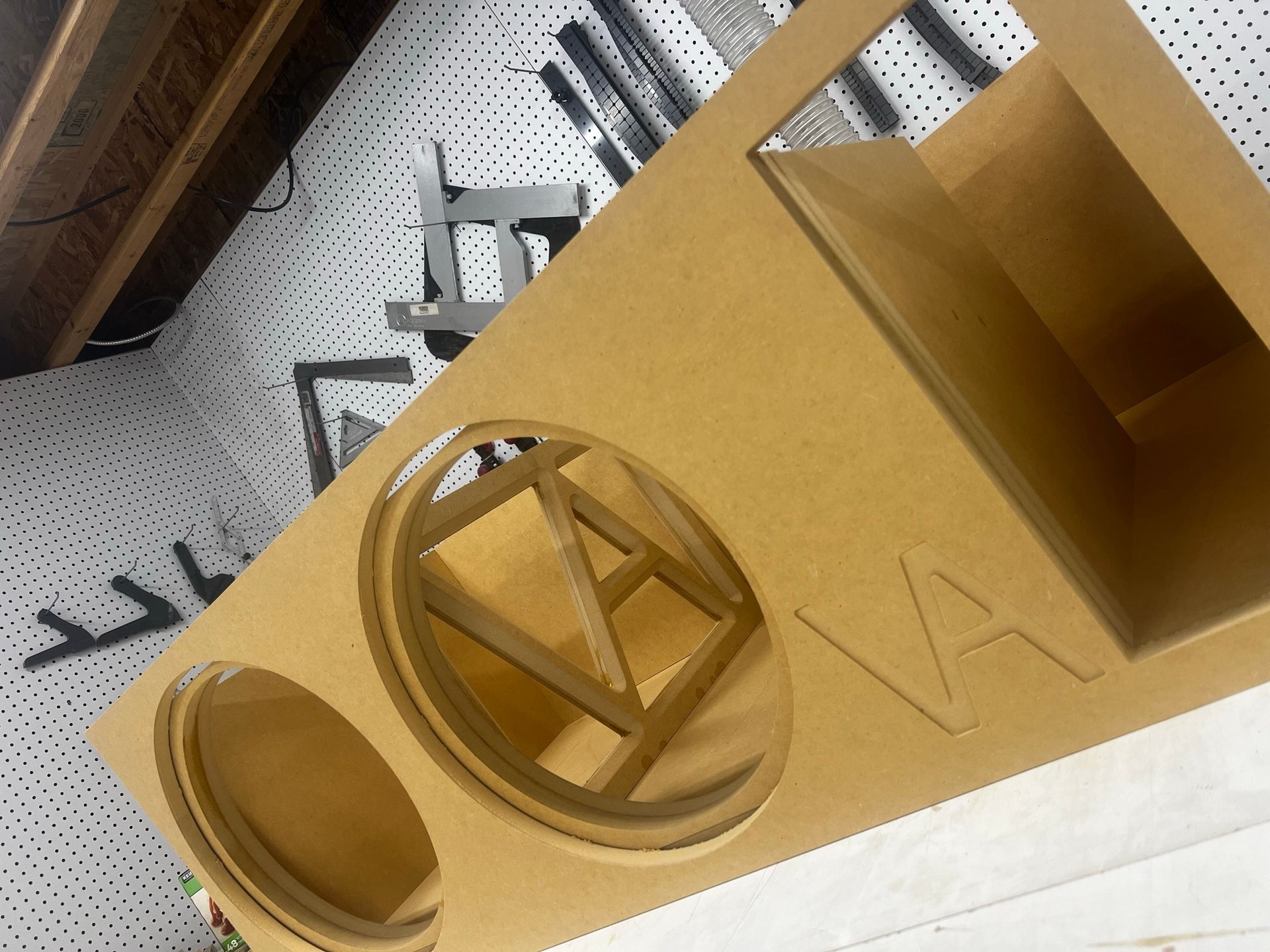 A piece of wood with the letter va on it