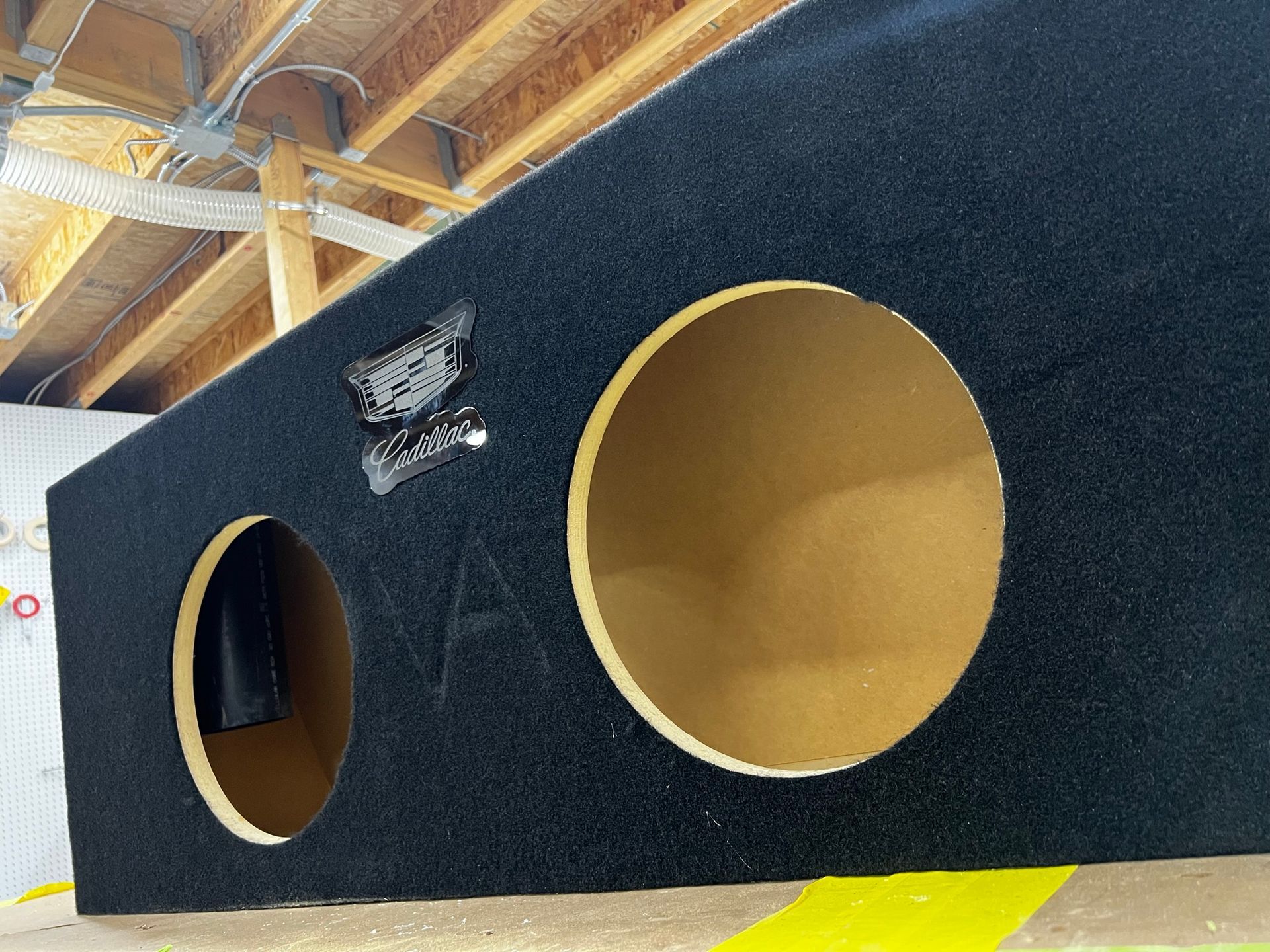 A black box with two round holes in it