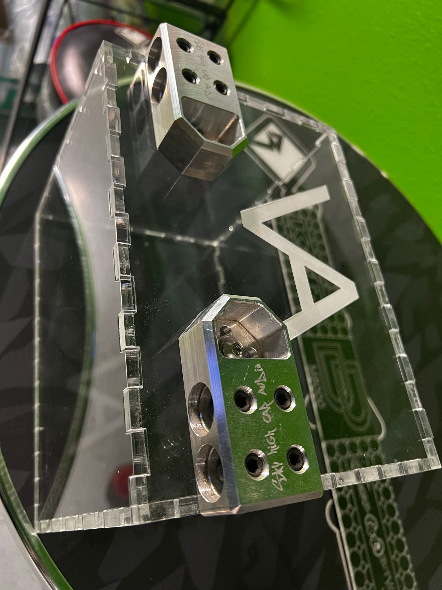 A couple of dice sitting on top of a glass table.