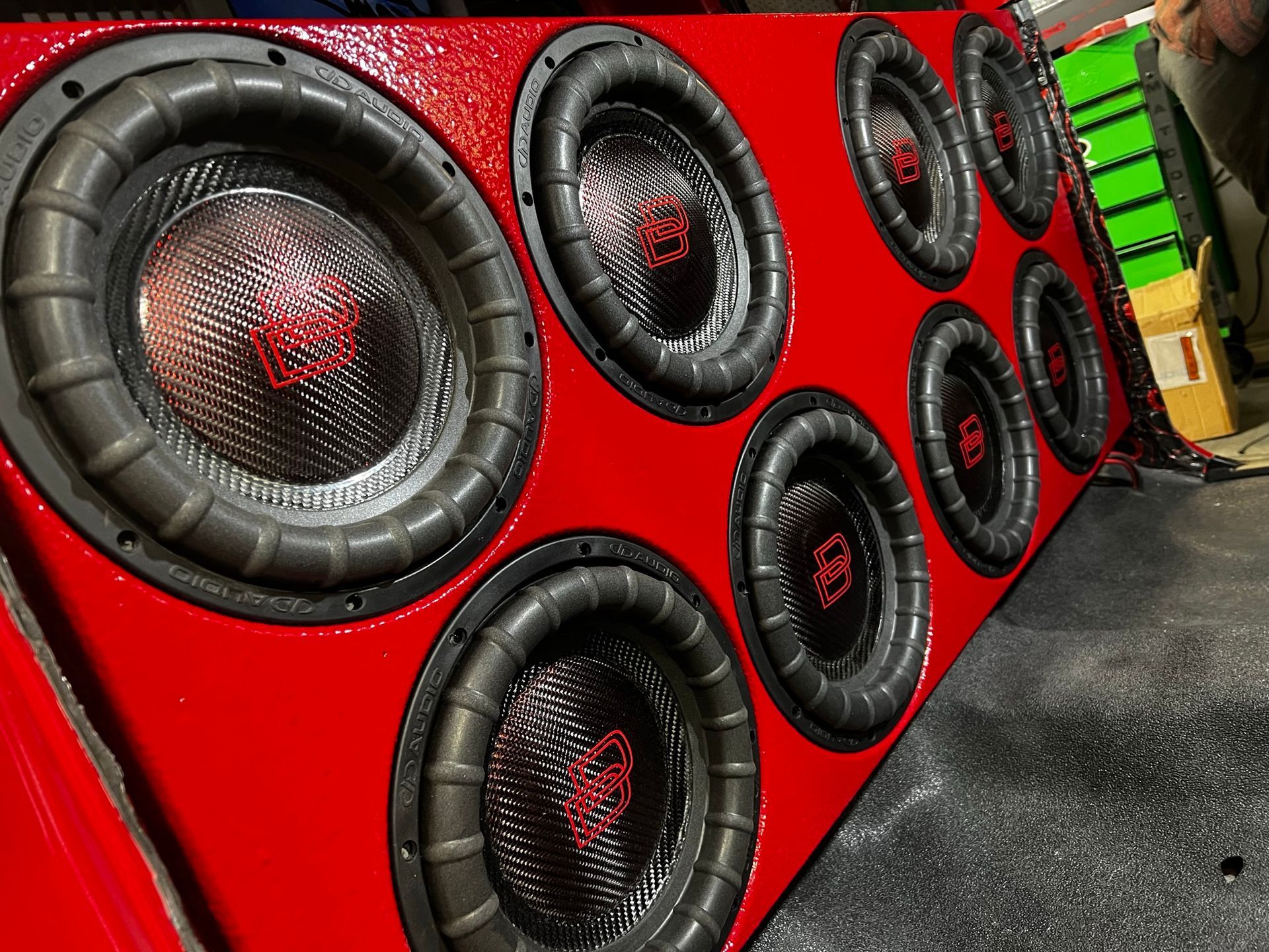 A red box with a bunch of speakers in it