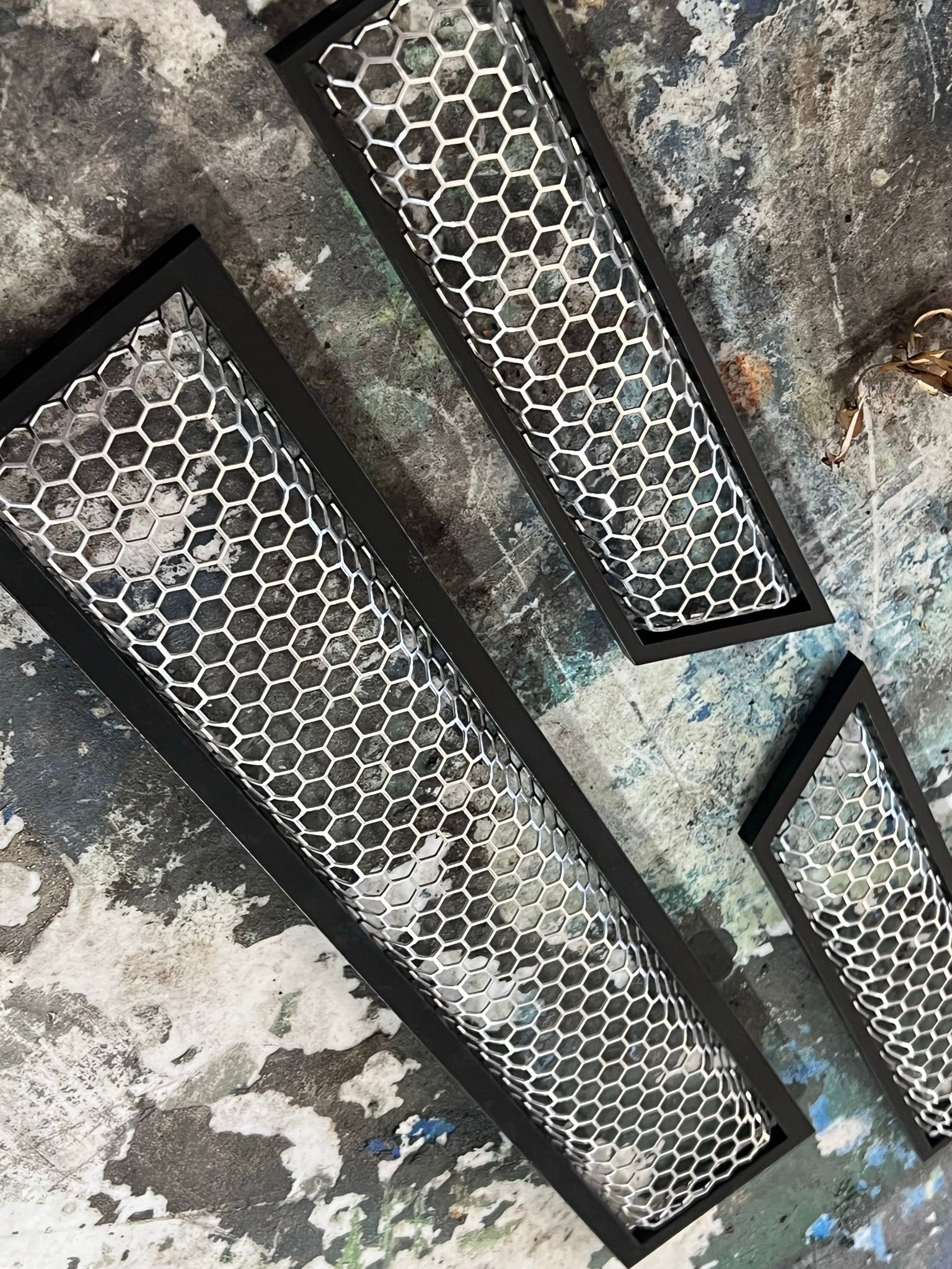 A close up of a honeycomb pattern on a wall.