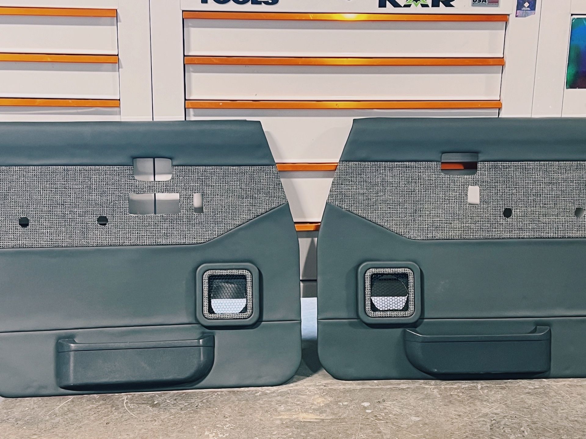 A pair of door panels are sitting next to each other