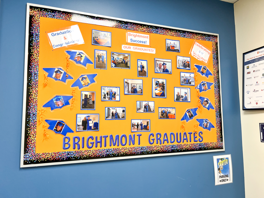 A bulletin board with pictures of brightmont graduates