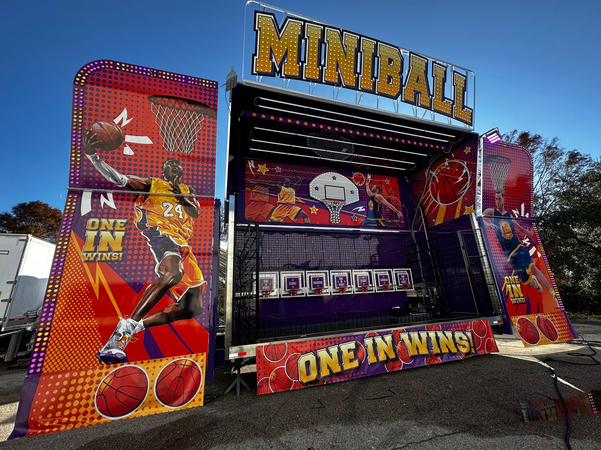 Basketball arcade game with green, pink, and yellow accents; 