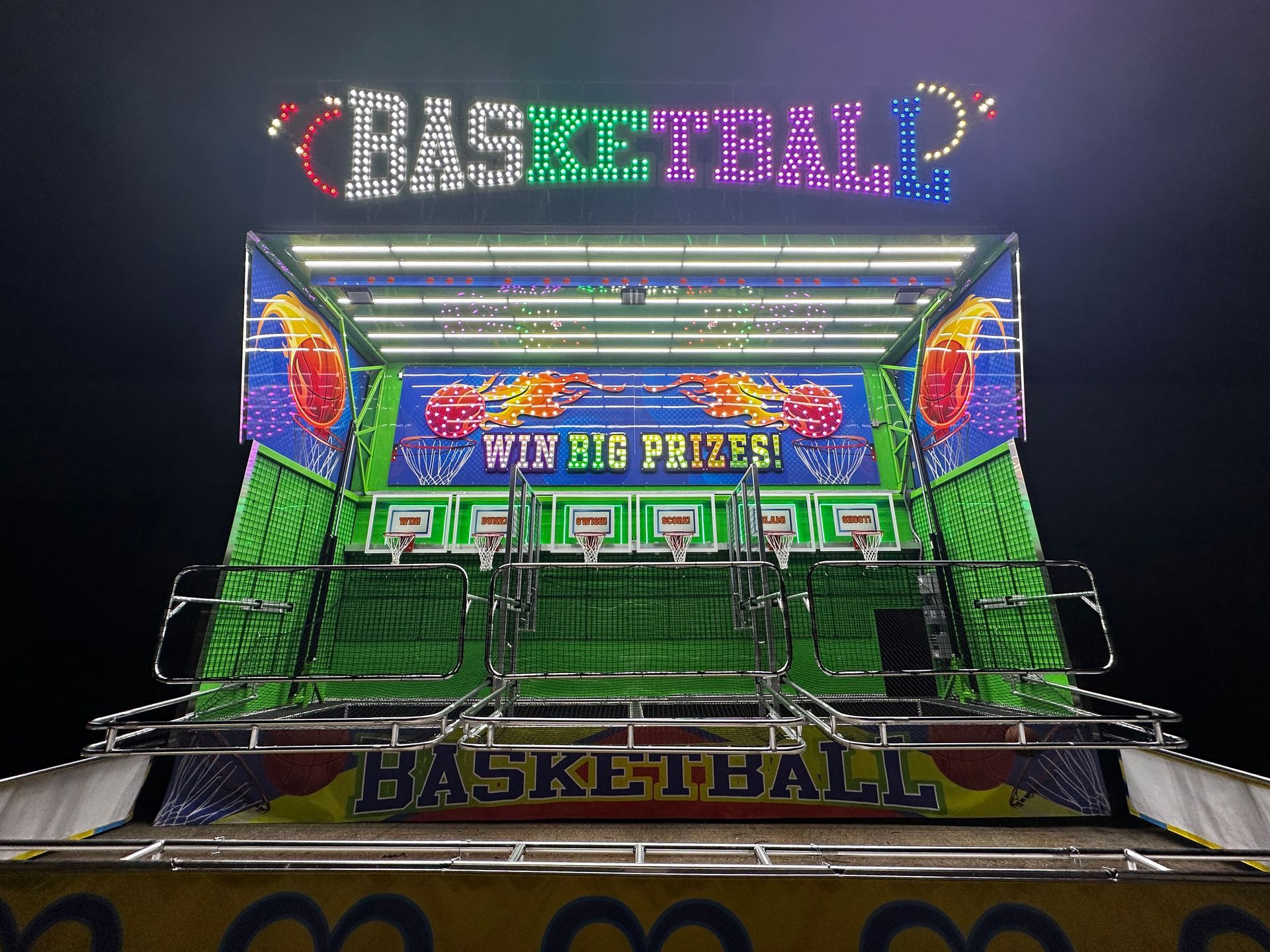 Person paying for food at a food truck window; burgers and fries visible.