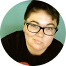 A close up of a person wearing glasses in a circle.