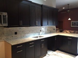 Kitchen with Black Cabinet — Providence, RI — Great In Counters
