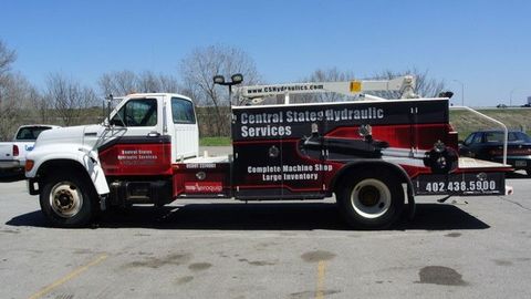 A Red And White Truck Is Parked — Lincoln, NE — Central States Hydraulic Services