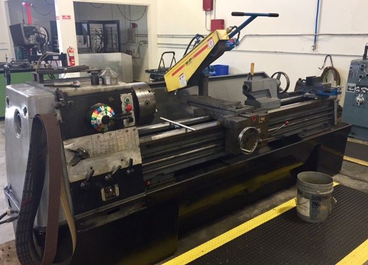 Lathe Is Sitting In A Room With Yellow Lines — Lincoln, NE — Central States Hydraulic Services
