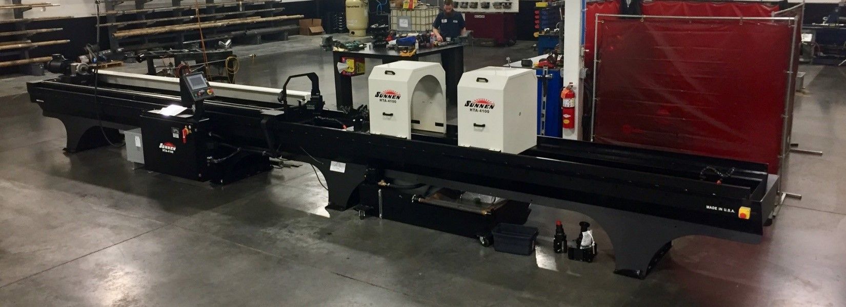 Machine Is Sitting On A Conveyor Belt — Lincoln, NE — Central States Hydraulic Services