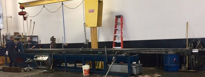 Large Machine Is Sitting In A Factory — Lincoln, NE — Central States Hydraulic Services
