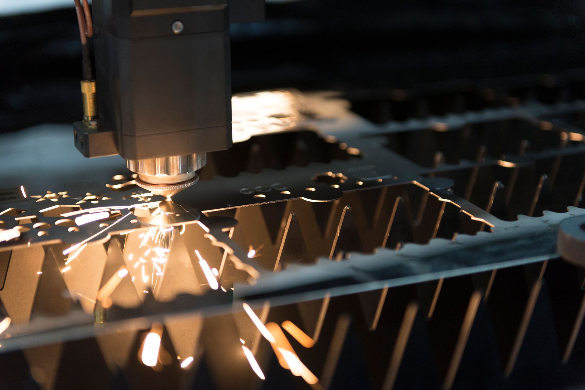 CNC laser cutting sheet metal, showcasing high accuracy in CNC precision machining.