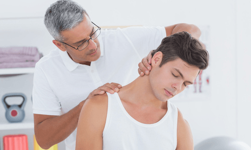 Man Treating a Backache — Sunnyside, WA — Yakima Valley Chiropractic Center