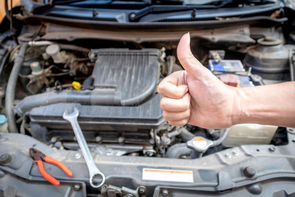 Mechanic giving a thumbs up after the inspection, indicating a positive outcome — Mobile Roadworthy in Smithfield, NSW