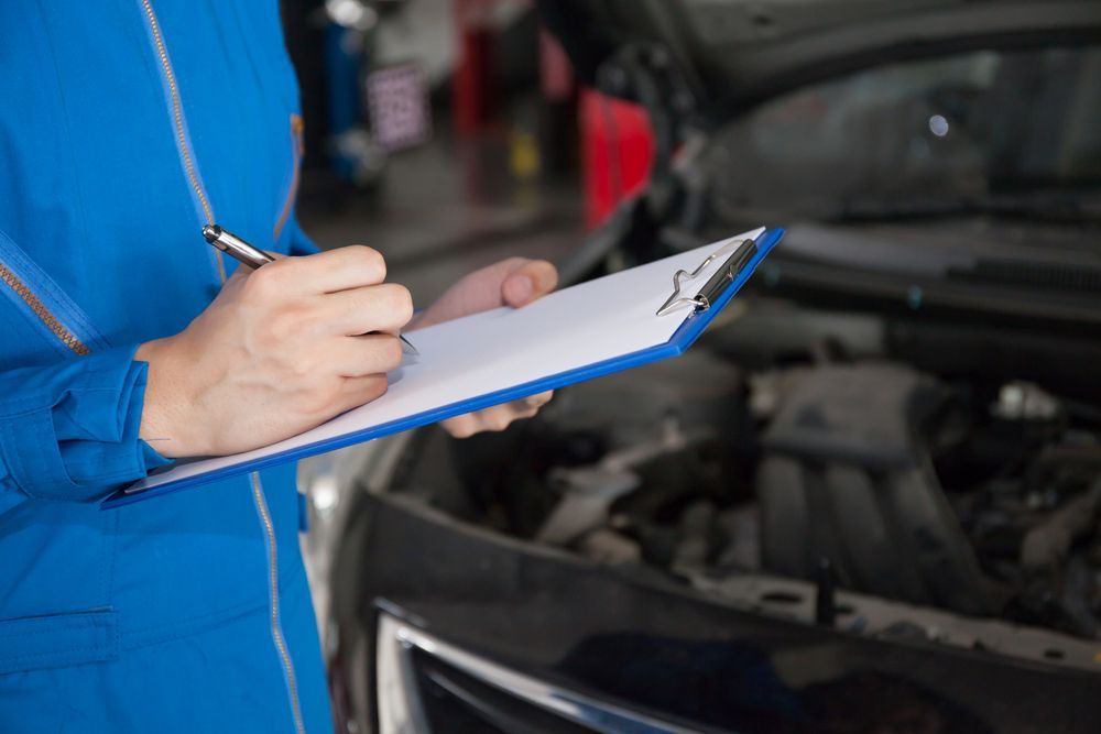 Mechanic in Blue Jumpsuit — A1 Mobile Safety Certificates in Gordonvale, QLD