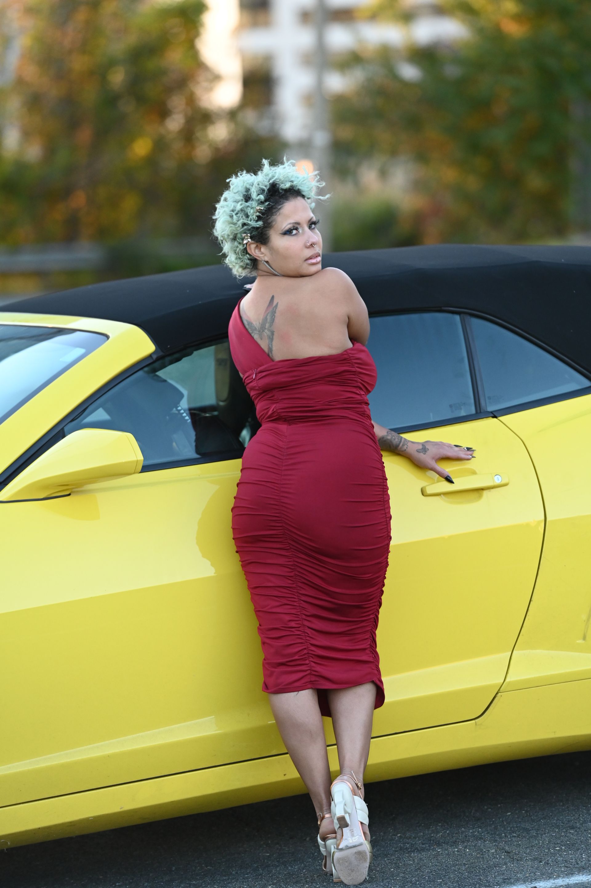 Woman Posing Showing Back And Holding Door of Camaro - McLean, VA | Haute Feng Shui