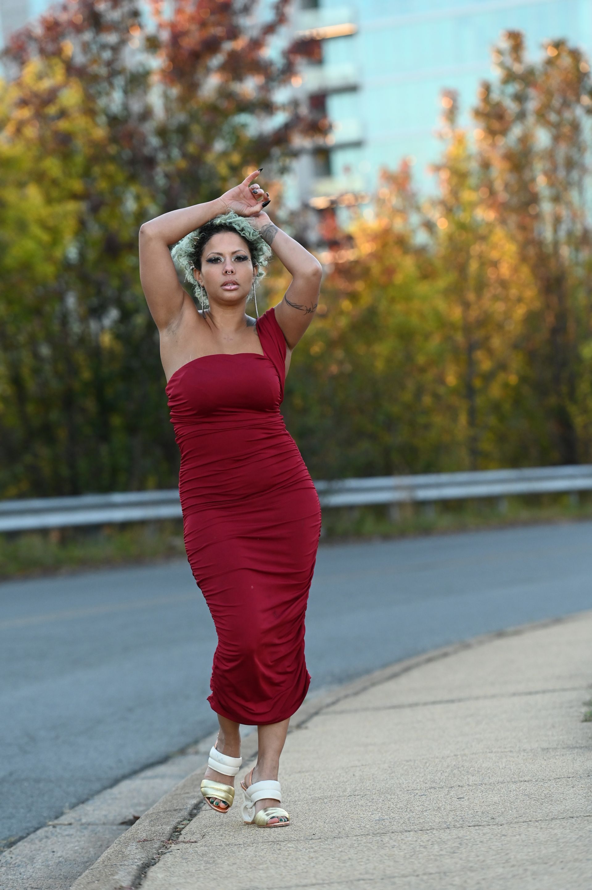 Woman Both Hands Up Posing Beside Sidewalk - McLean, VA | Haute Feng Shui