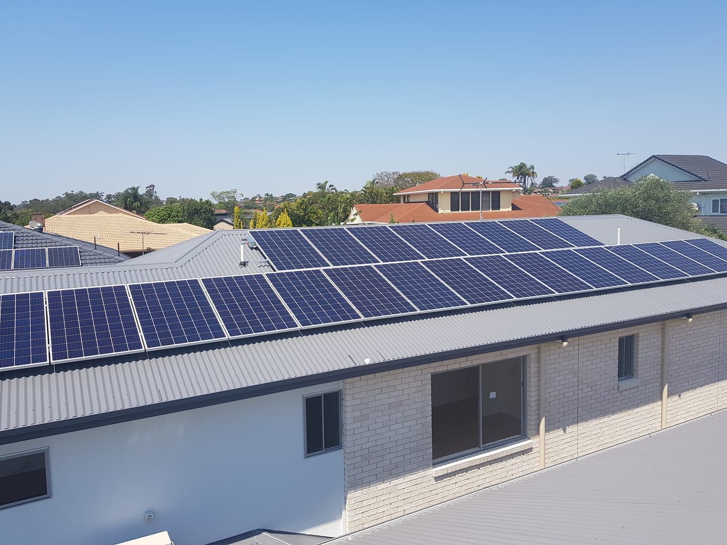 Solar Panels on Top of Residential House Roof — Ryde Energy in Browns Plains, QLD