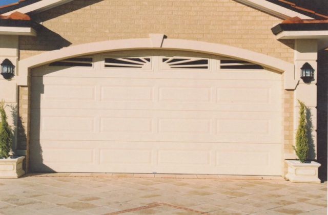A white garage door with a british flag design on it