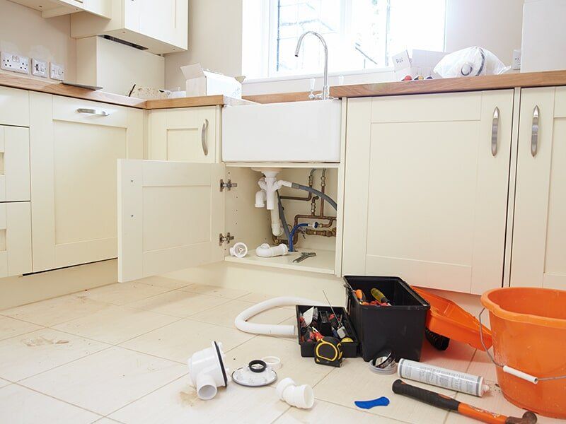 Plumber Tools in the Kitchen — Plumbers in Moranbah, QLD