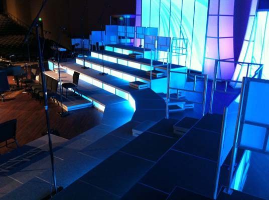 A stage with a lot of blue lights on it