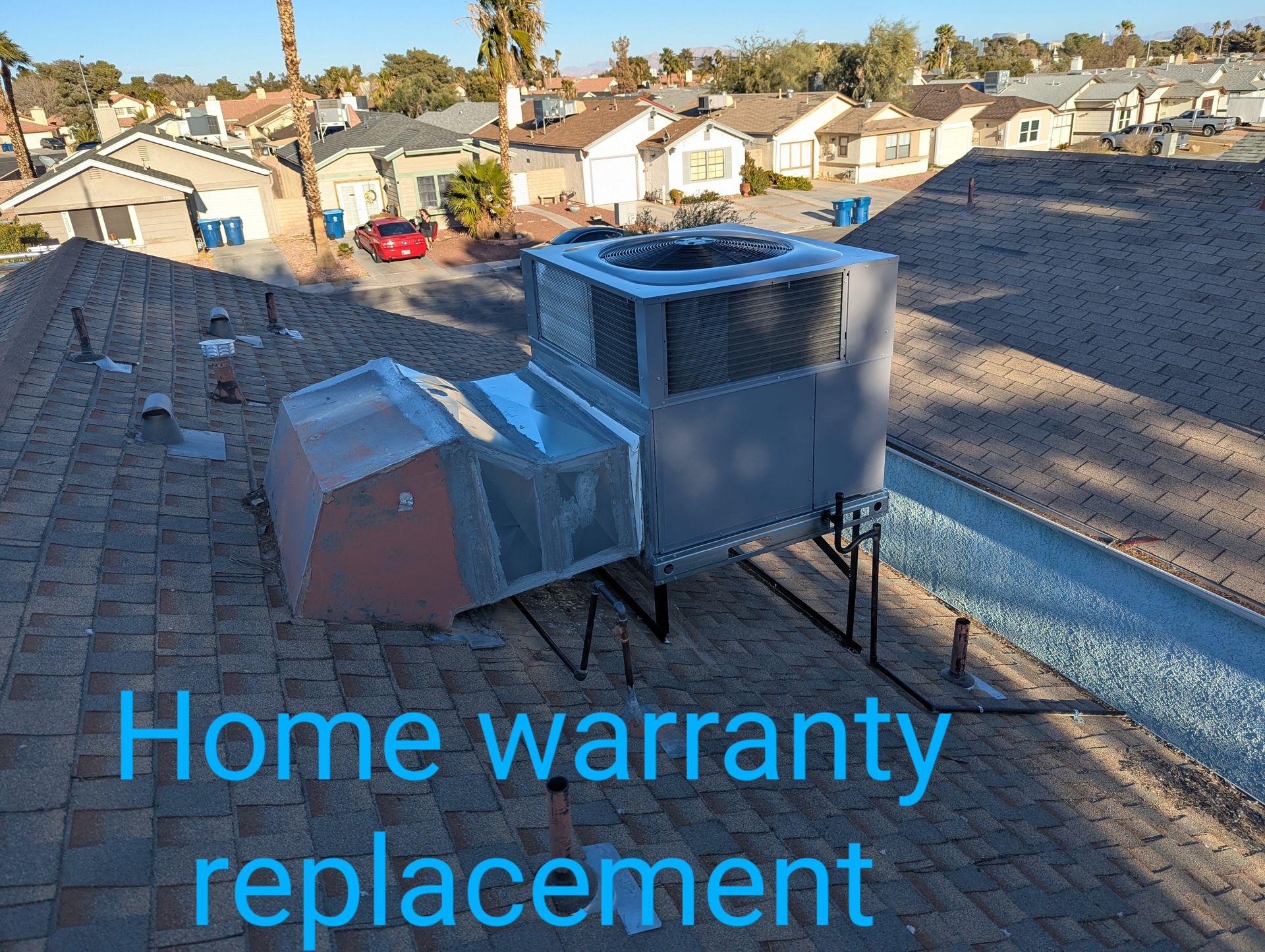 A picture of a home warranty replacement on a roof