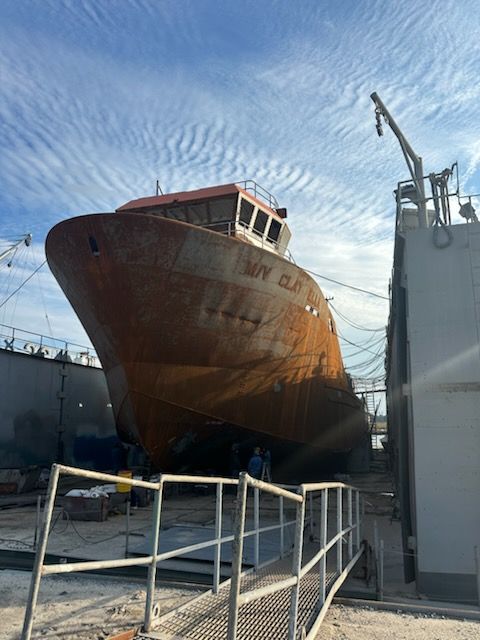 Cargo ship recieving maintenance