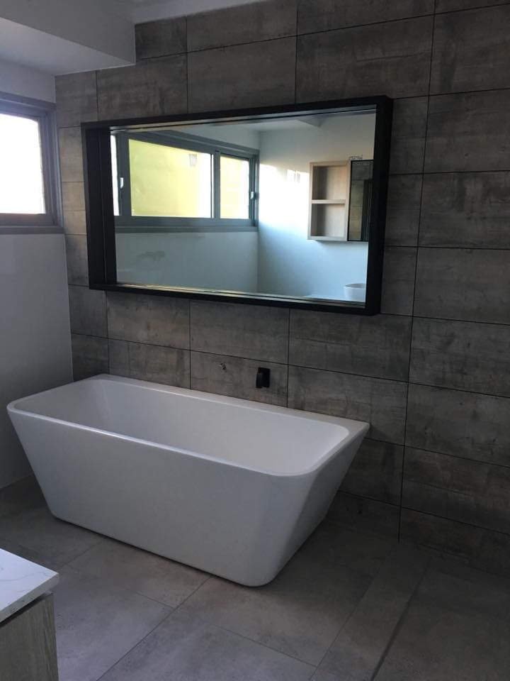 renovated bathroom with new tub in bundaberg
