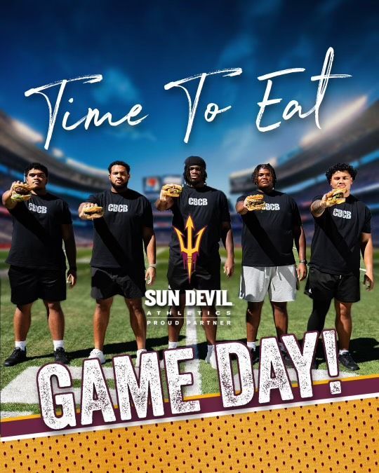 A group of men standing on a field with the words time to eat game day
