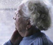 Senior citizen looking outside - Law services in Sterling Heights