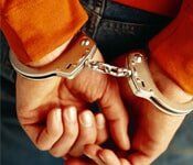 Man hands with handcuff - Law services in Sterling Heights