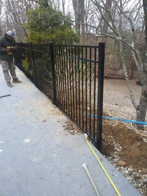 Repairing a wooden fence