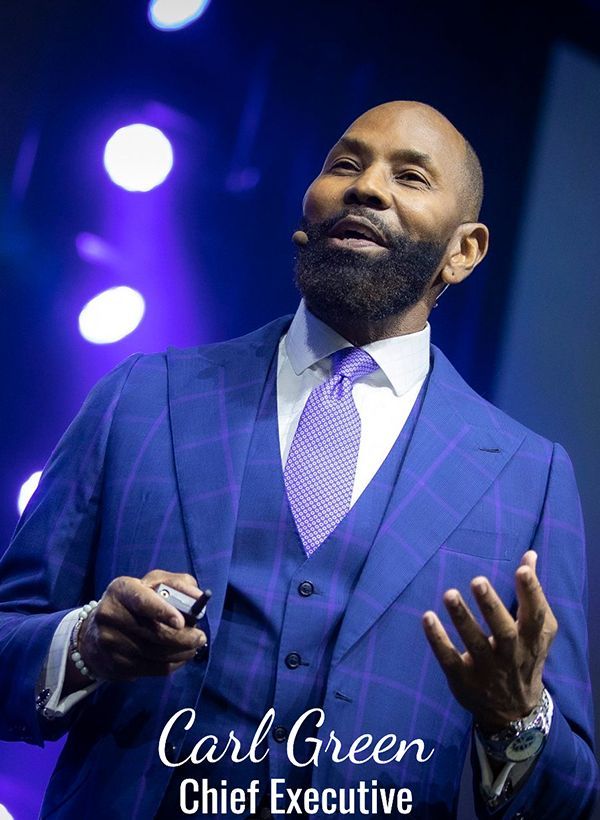 Carl Green Speaking on Stage