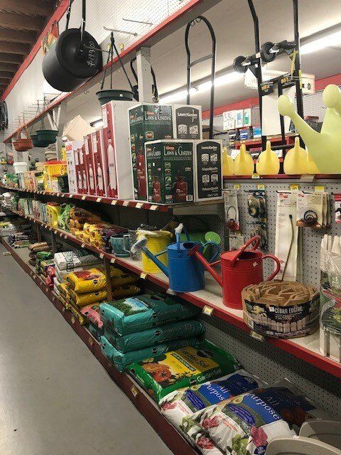 Grocery aisle of watering can | San Mateo, CA | Bayside Building Materials, Inc.
