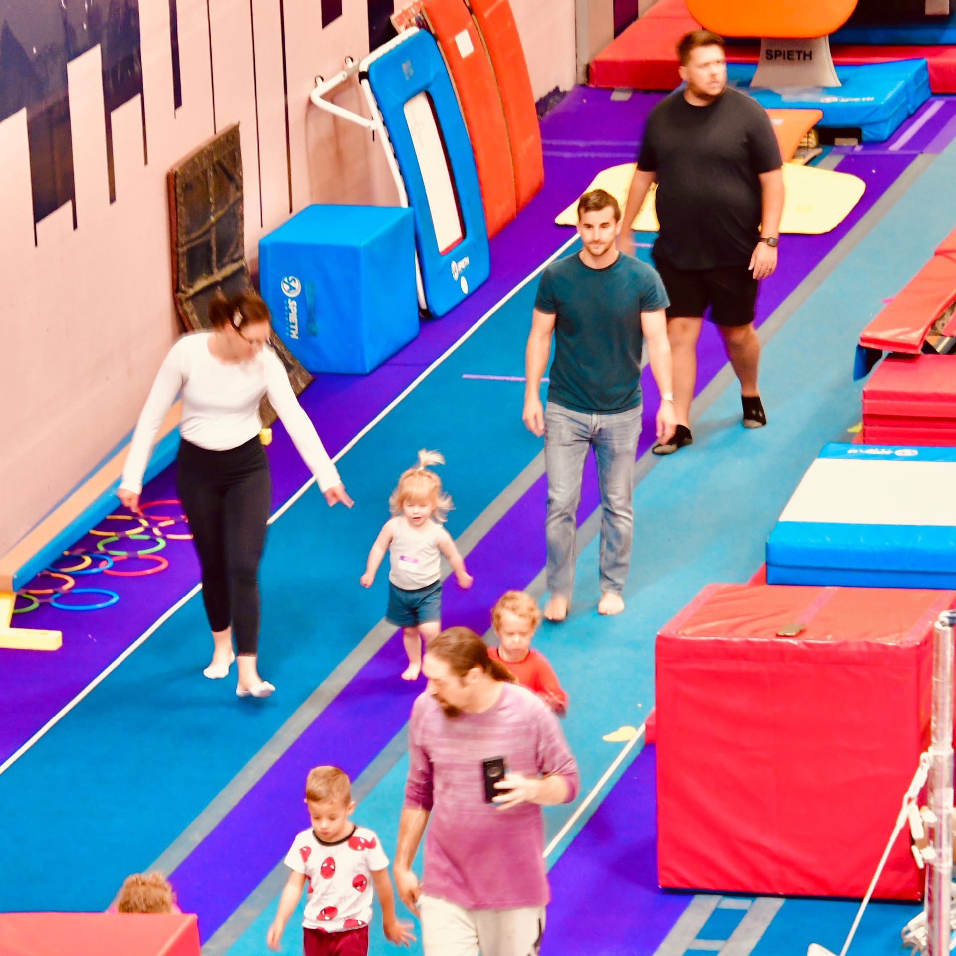 Parents and toddlers finishing class