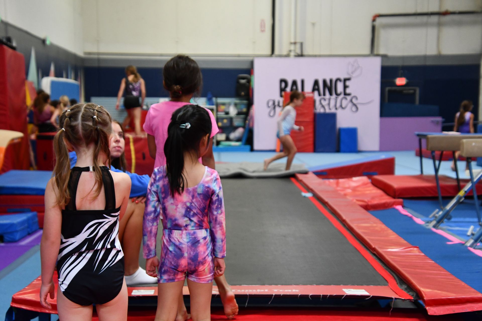 A child listening to instructions on Tumble Trak