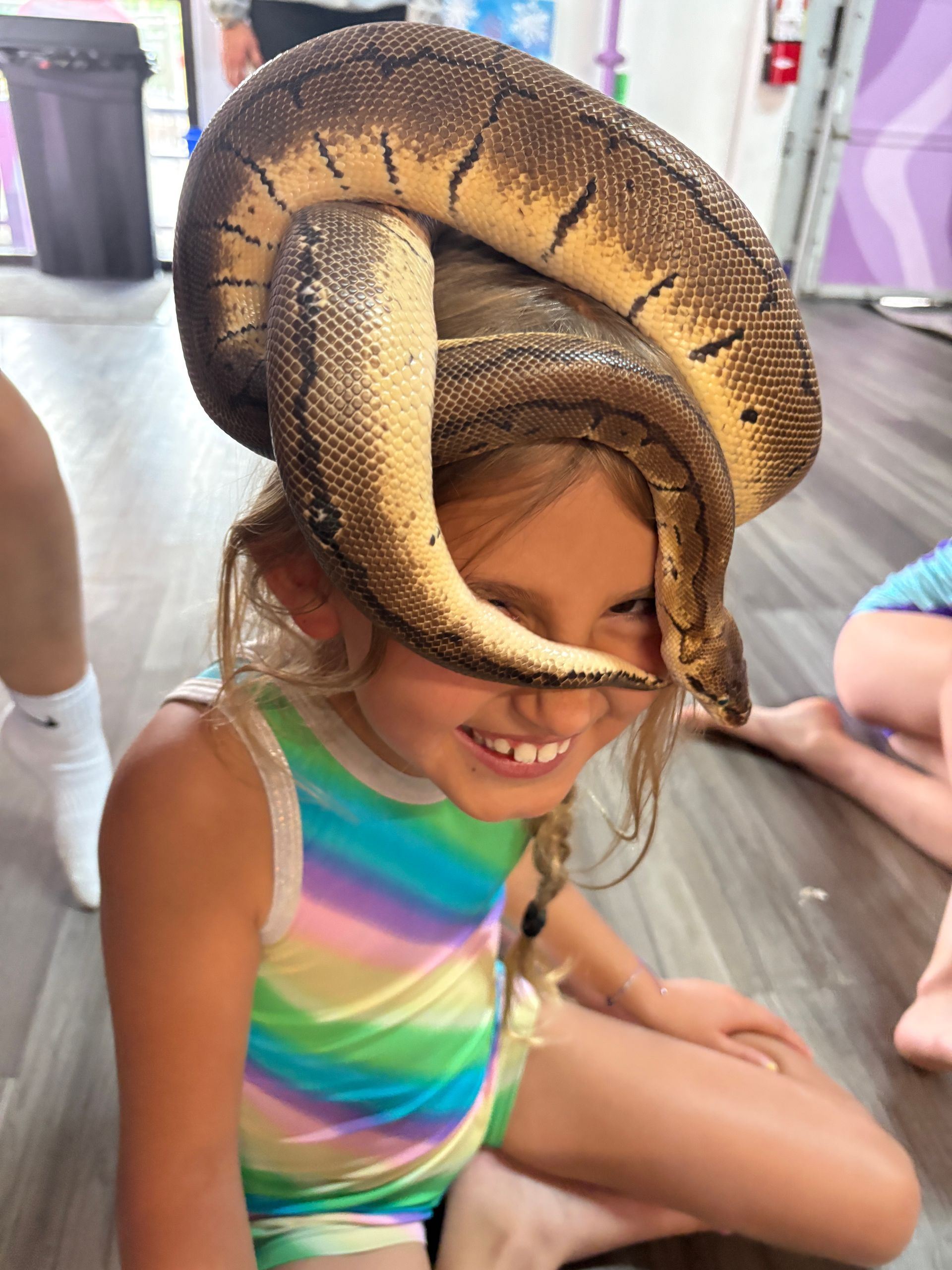 Picture of camper holding snake at camp