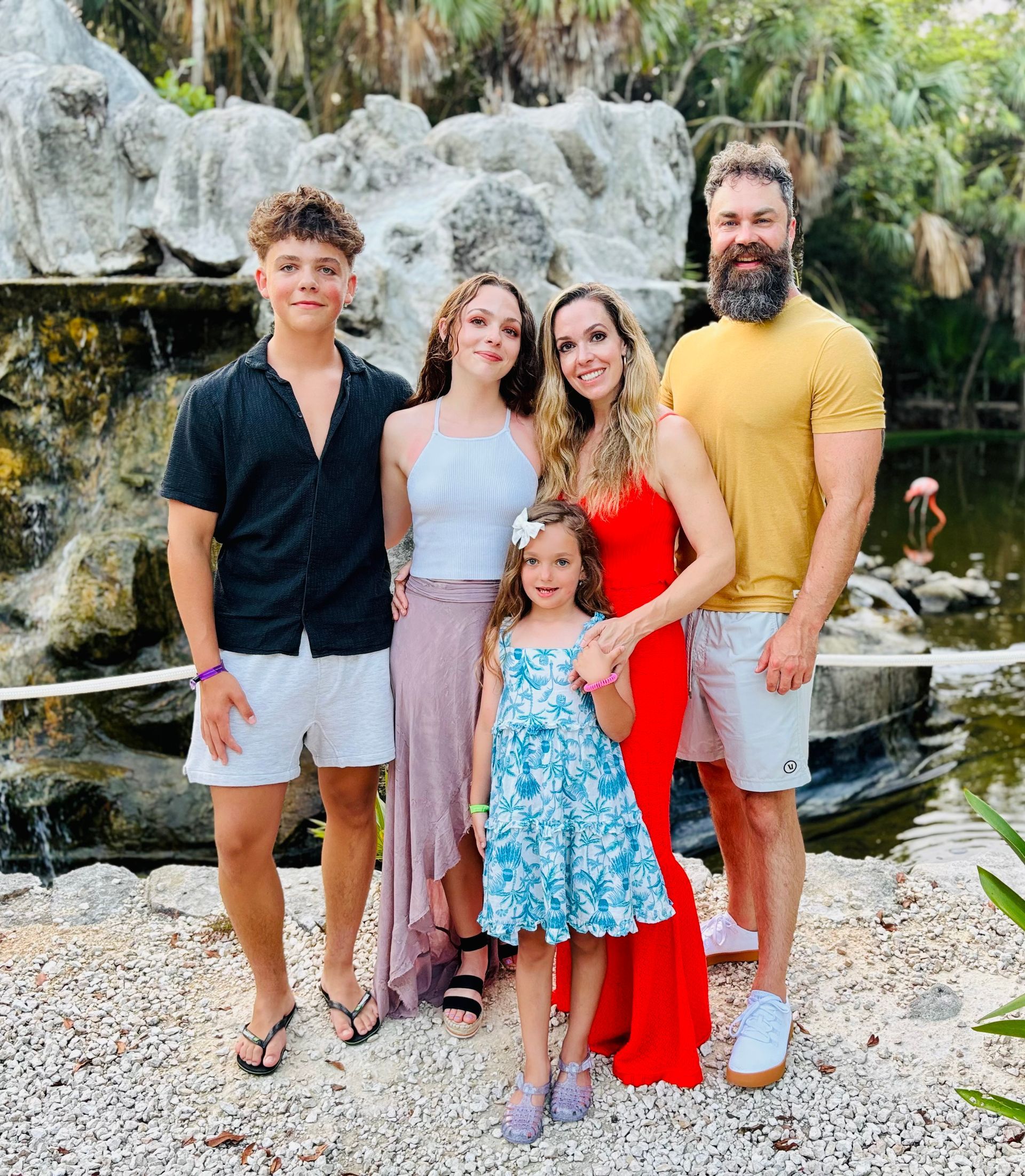 A picture of one of our owners, Coach Jen, with her family