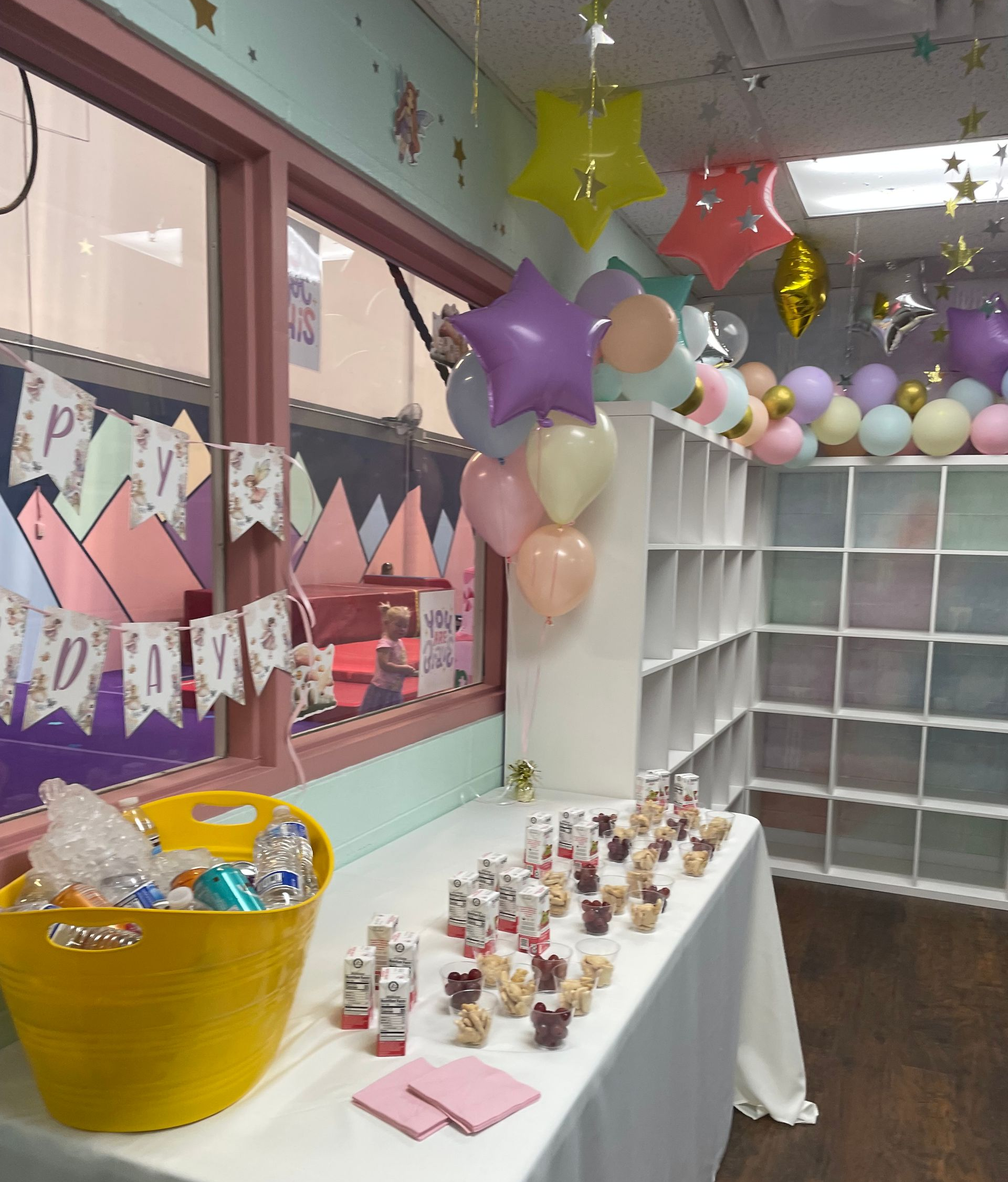 A picture of the party room decorated in vibrant colors for a party