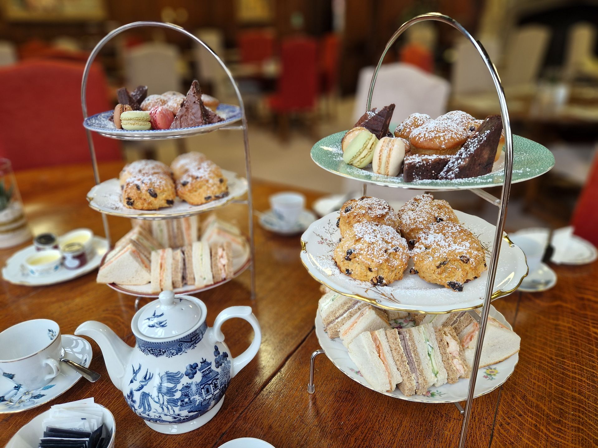 Tiered afternoon tea with scones and sandwiches, showcasing familiar, food for SEND schools