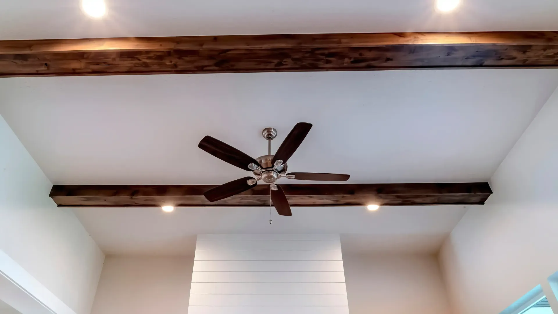 Lighting on the Ceiling with beautiful beams and fan