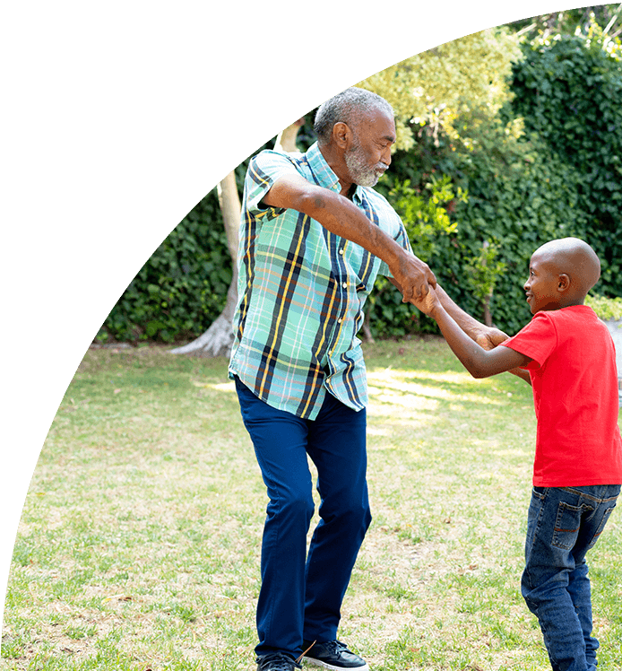 a man dancing with his grand child